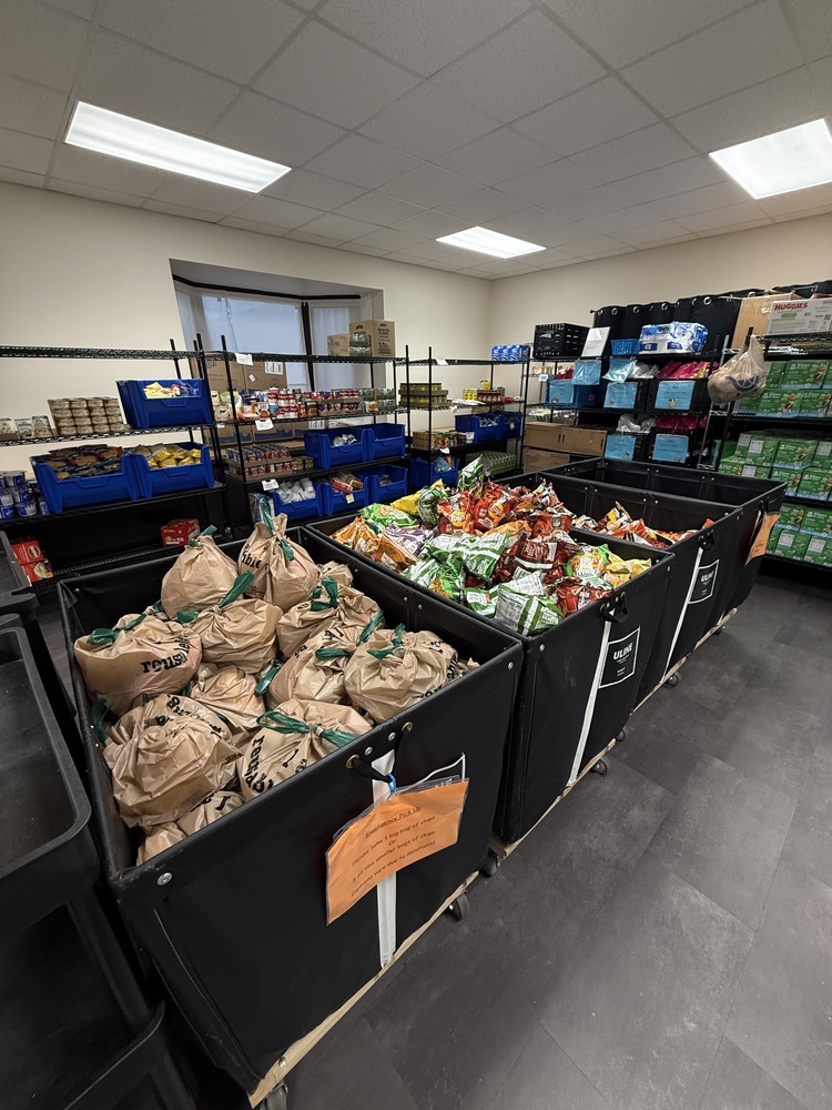 Sonny day food waits to be passed out. The next distribution day is Nov 15.