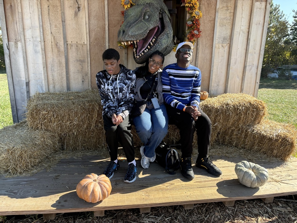 Students K. Grey, S. Simmons and and Ms. Elliott