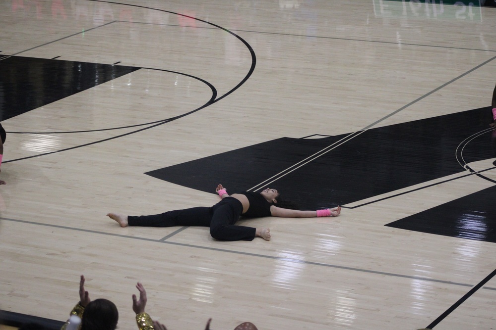 I'Bri Beck performing a "death drop" dance move