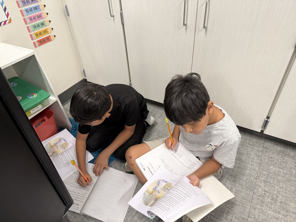Students reading the text together.