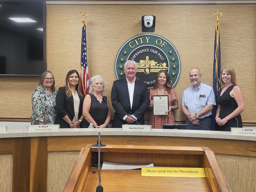 Receiving Mayoral Proclamation from Mayor