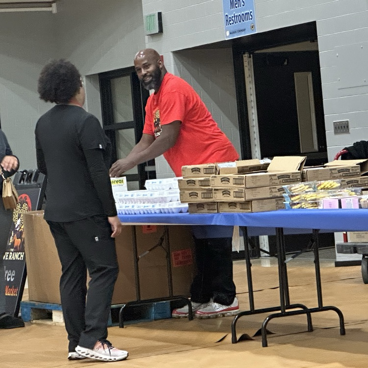 volunteers passing out food