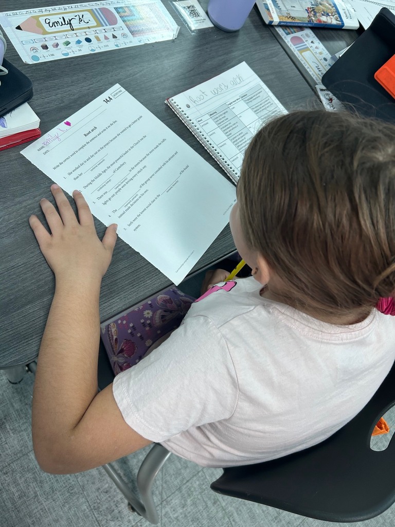 Fourth grade students working on the morphology of the root arch.