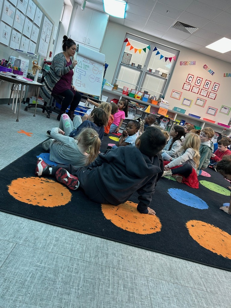 Kindergarten students reviewing 2D shapes.