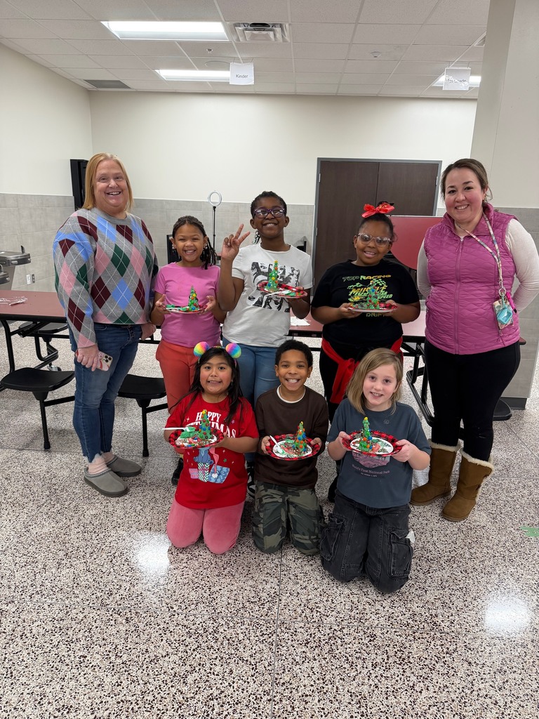 Students with their yummy Christmas trees.