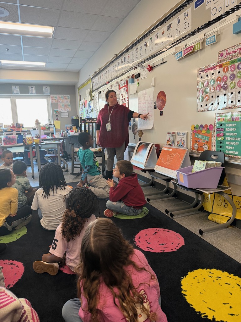 1st grade students reviewing all the sounds "ed" makes at the end of a word.