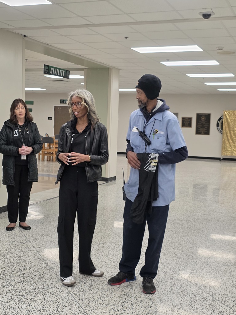 Presenting John Adams and saying kind words is Kerrie Taylor.