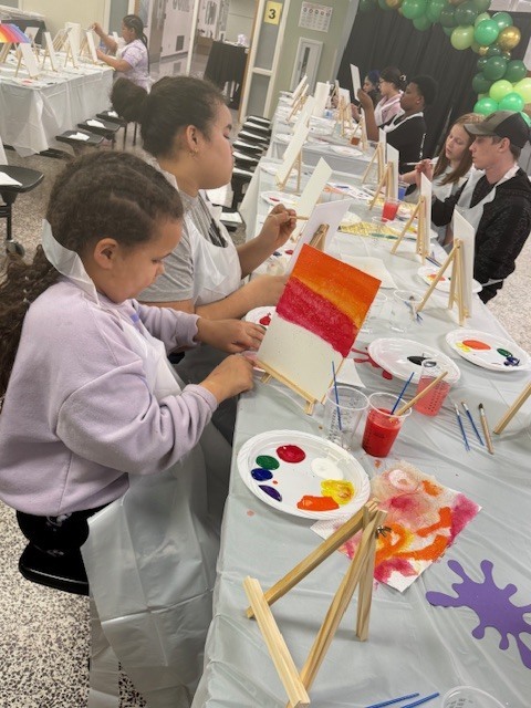 Student enjoying expressing themselves