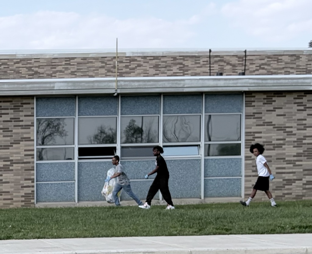 Collecting trash in the school yard