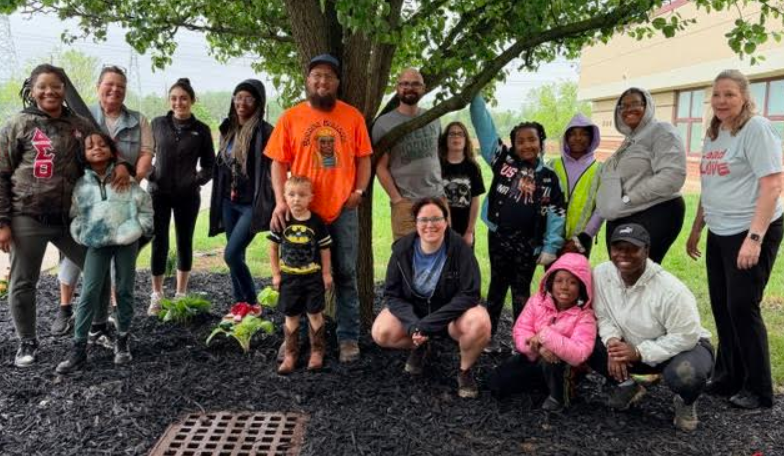 Brookview staff and families participating in beautifying our school grounds, together :-)