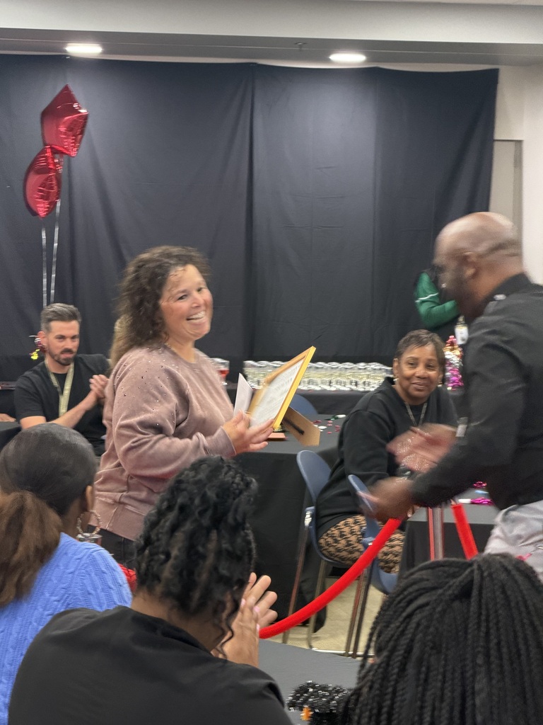 Mrs Dillard receiving her award