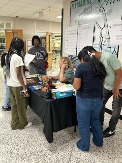 Ms. Nicholson assisting with schedules. 