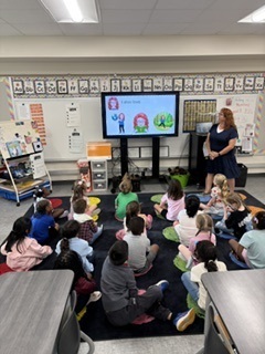 Mrs. Purvitis, the new school counselor, introduces herself to  Mrs. Williams' class.  