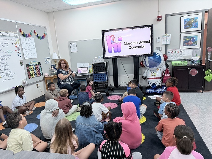 Mrs. Purvitis, the new school counselor, introduces herself to  Mrs. Terry's class.  