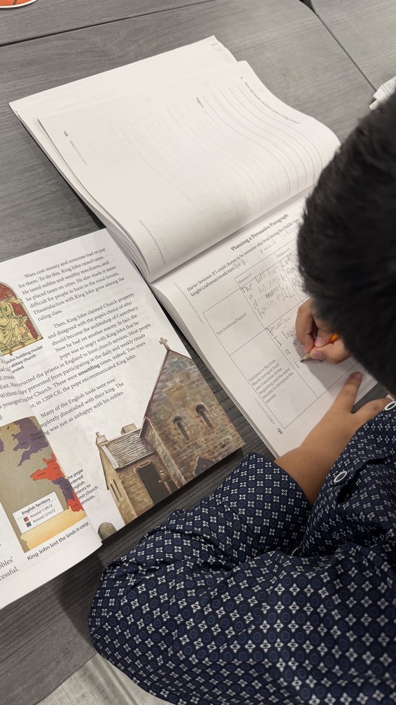 4th grade students using text evidence to explain why they chose the job they chose.