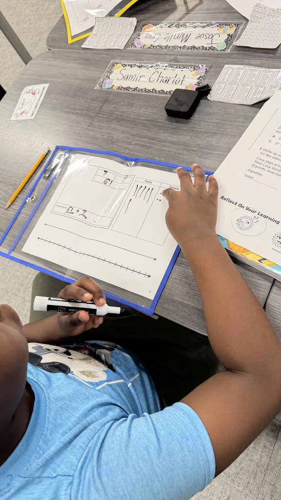 2nd grade students using word problem strategies on their exit ticket.