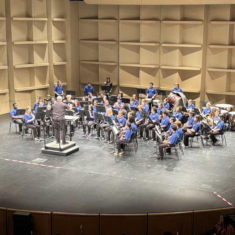 Raymond park band students and director brooks conducting