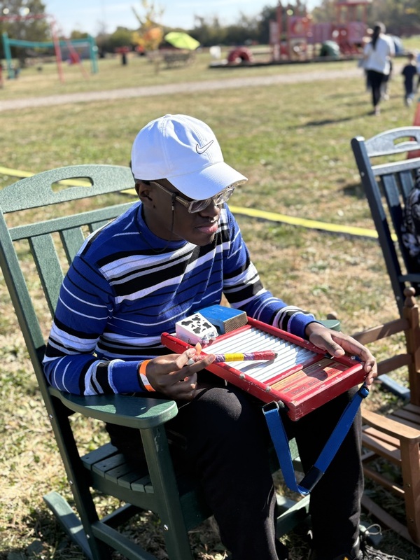 Student K. Gray plays an instrument