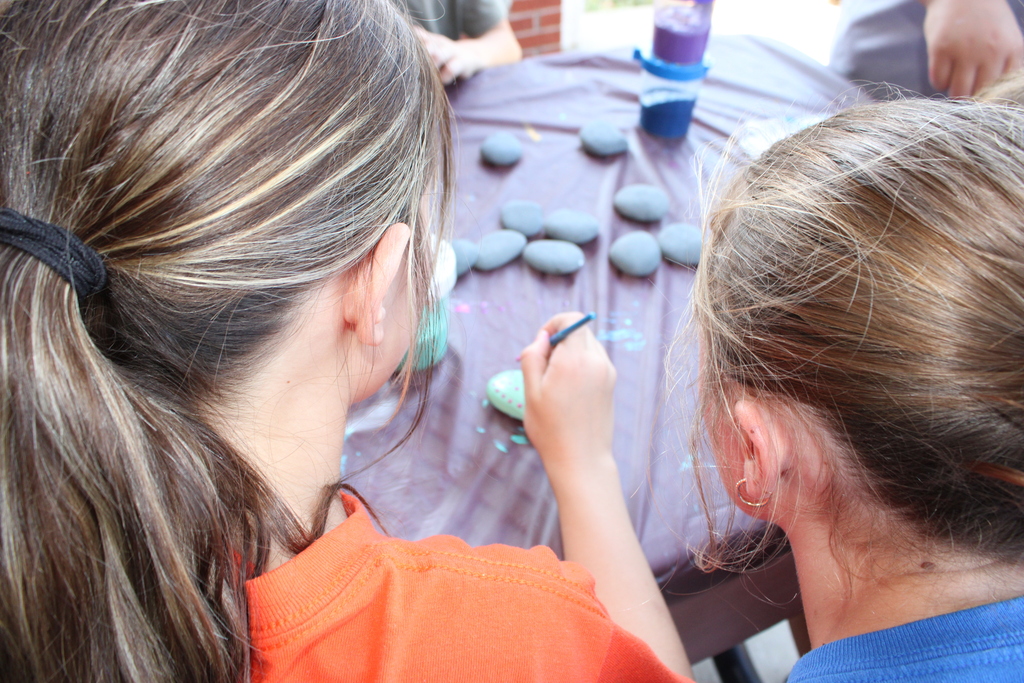 students painting rocks