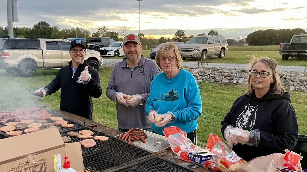 Mr. Lile and board members grilling