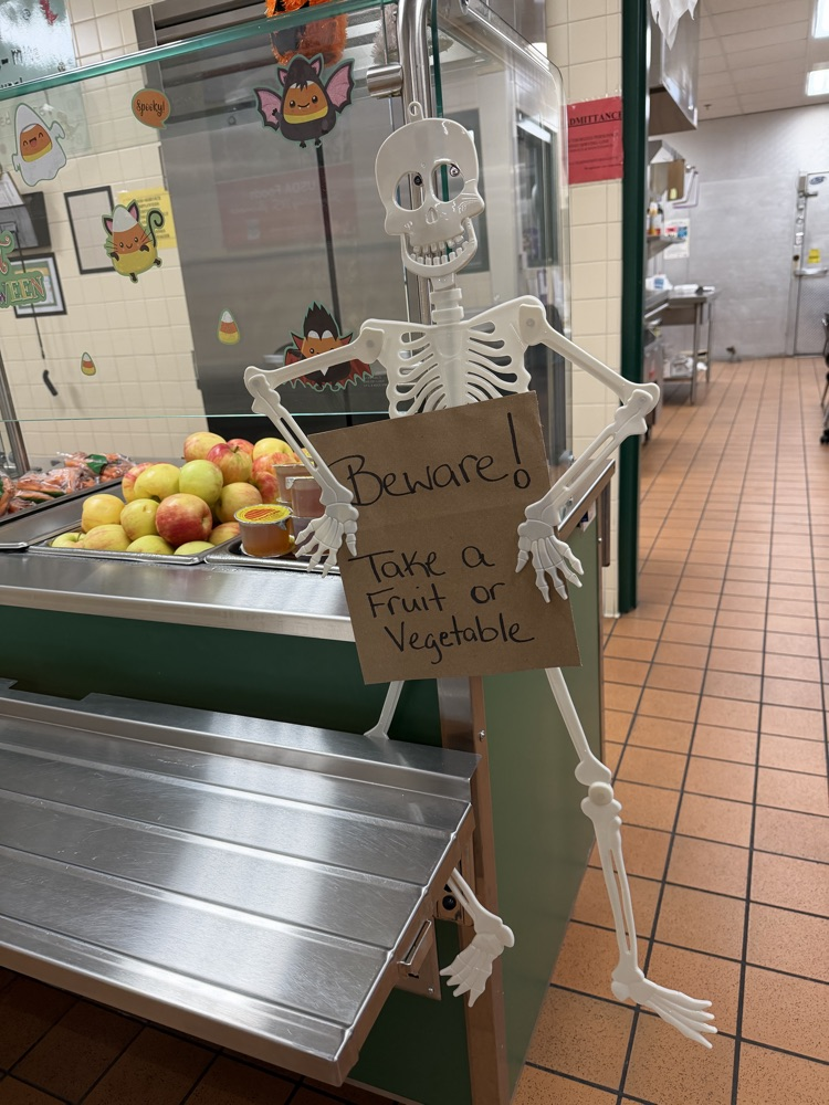 skeleton with apples