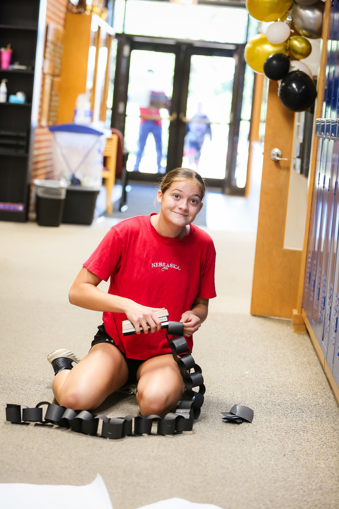 Student stapling paper