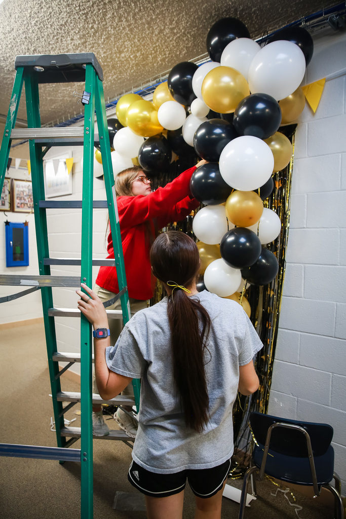 Junior girls with balloon arch