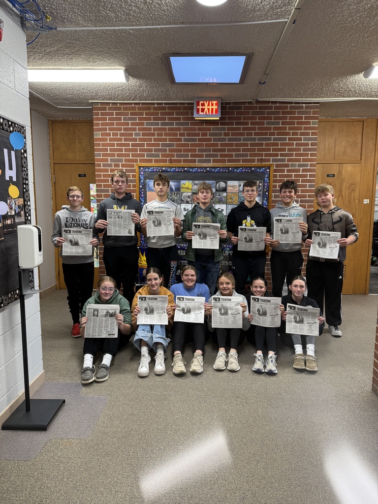 freshmen holding Tribune