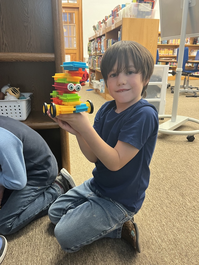 Children building with bristle blocks.