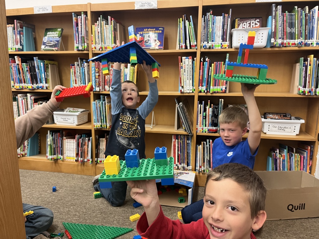 Children building with legos. 