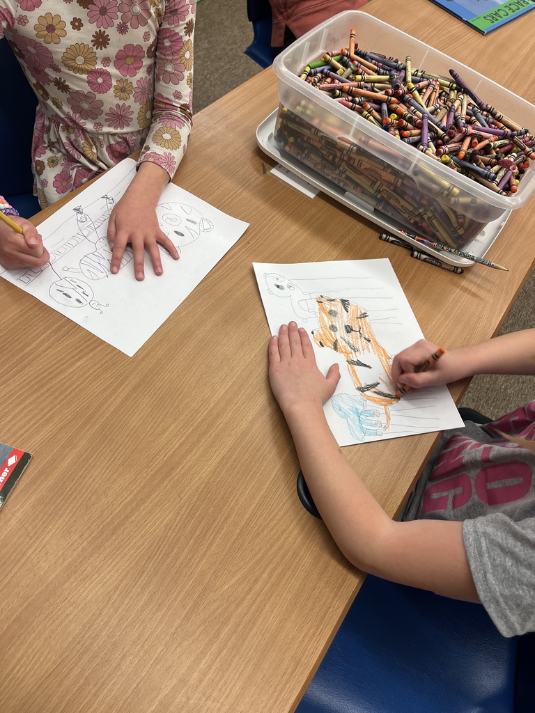 Children drawing a parade scene