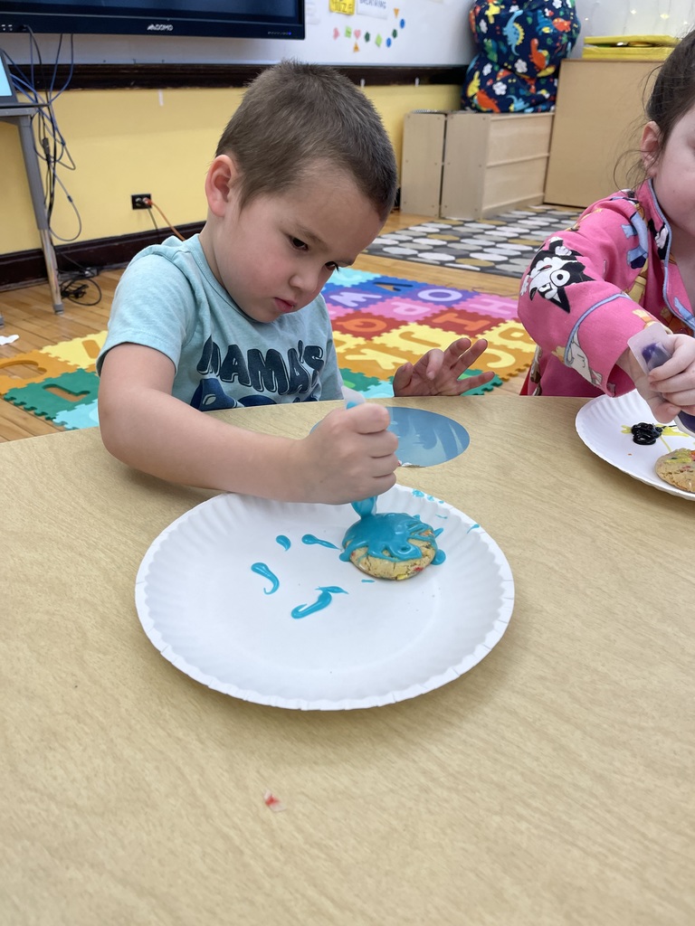 Hard at work- Decorating Cookies