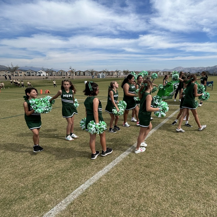 cheerleaders congratulate team