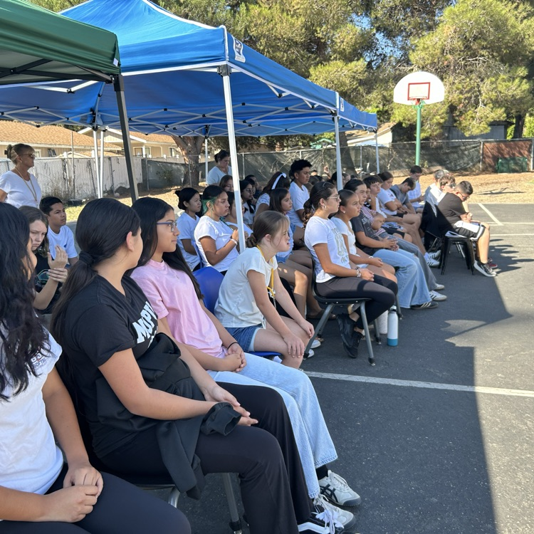 middle school watching EMT presentation