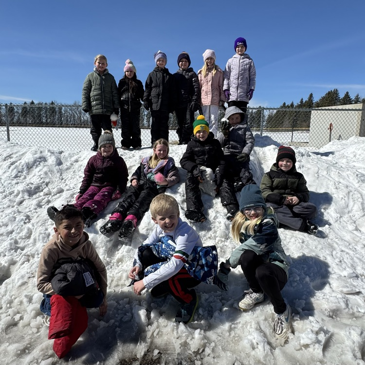  Second graders enjoying the sunshine and snow during recess today!