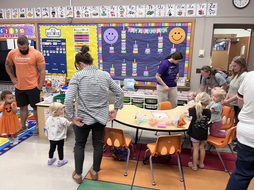 Children playing with their parents