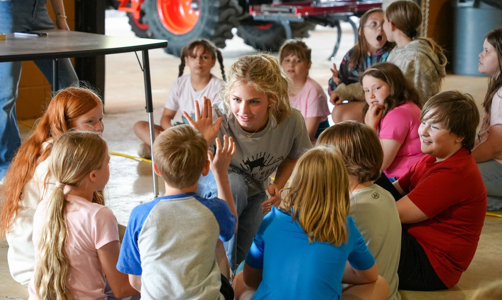 Ag student high fives student