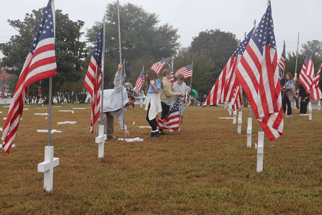 GMS students placing flags