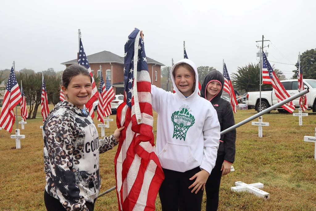 GMS students placing flags