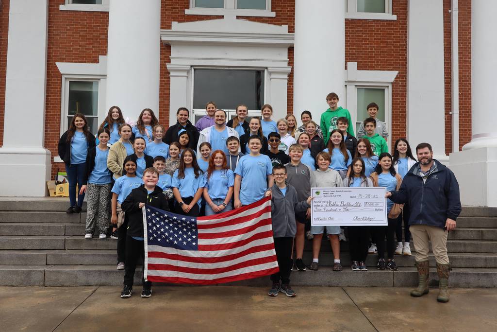 GMS students placing flags