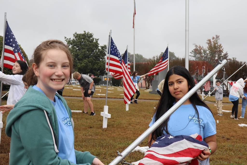 GMS students placing flags