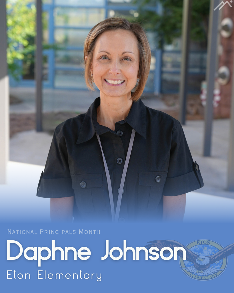 Woman with short hair smiles outside of a school building. Text reads, "Daphne Johnson Elton Elementary."