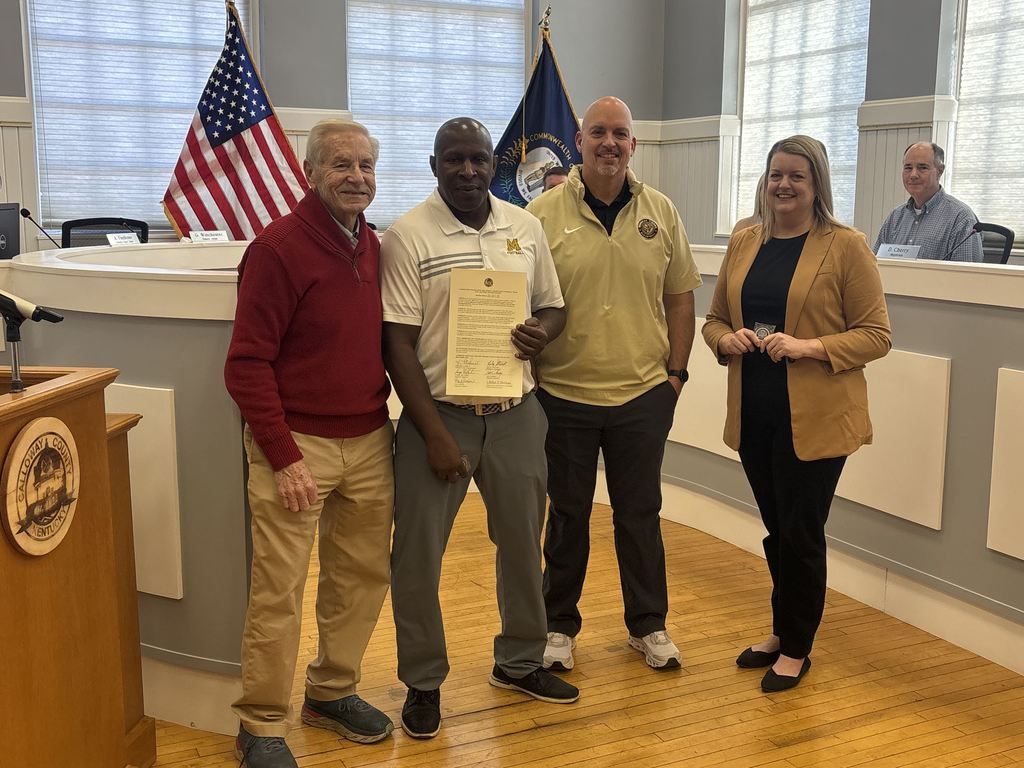 Coach Cunningham and football team recognized