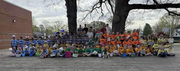 msu fraternity helps during in kindergarten Easter egg hunt 