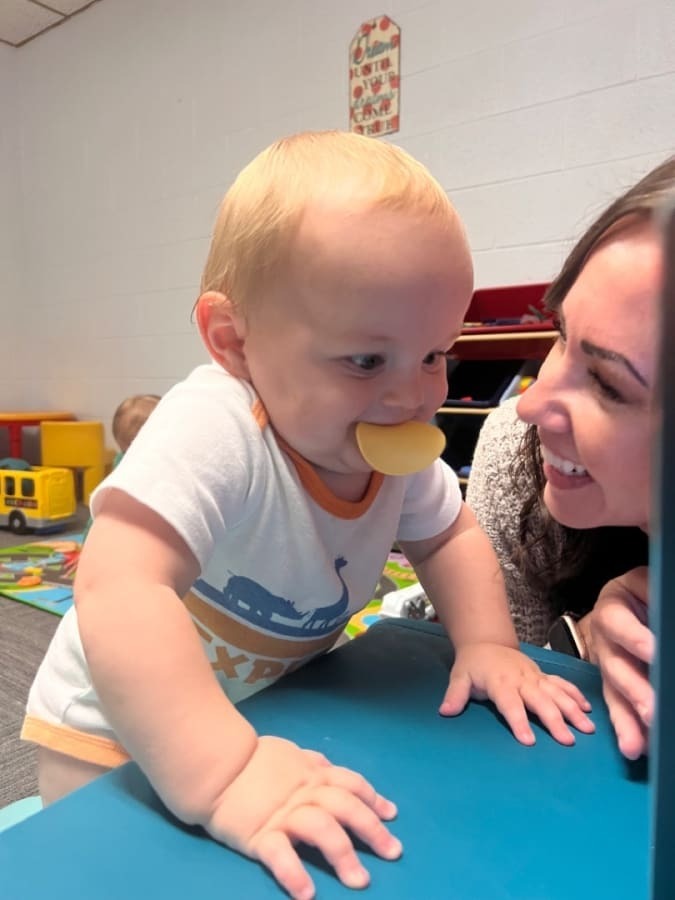 baby and teacher