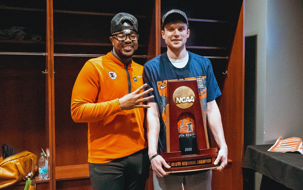 Kwa Jones and Tyler Underwood shown with the NCAA South Region trophy