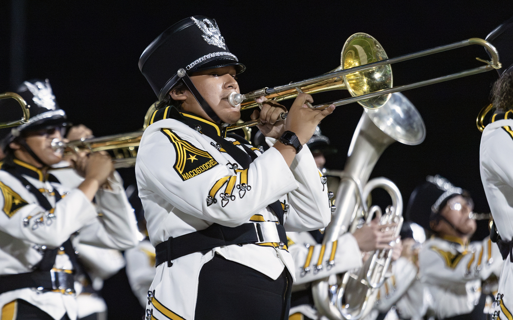 Band member performs on trombone