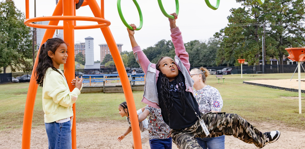 Students play on new equipment