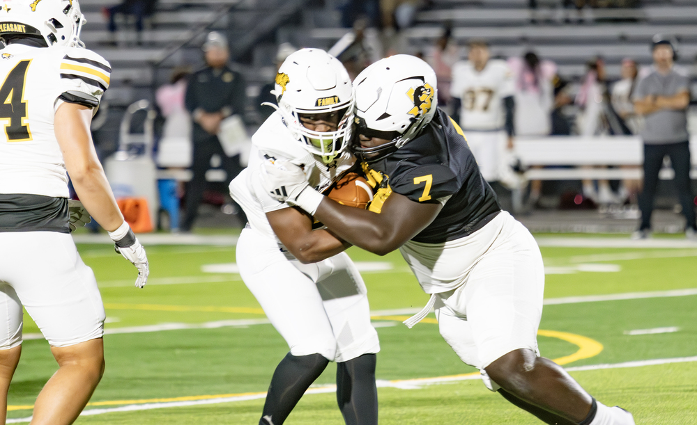 Dragon football player makes tackle