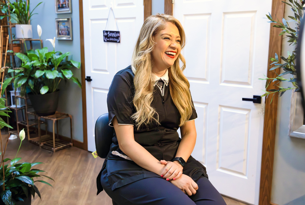 Antonia Sanchez sits in her salon